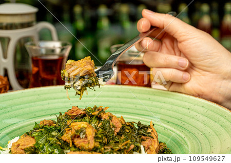 Pilau on Green Plate, Beef Pilaf, Traditional Asian Dish Plov also known as Polow, Pilav, Pallao, Pulao, Palaw 109549627