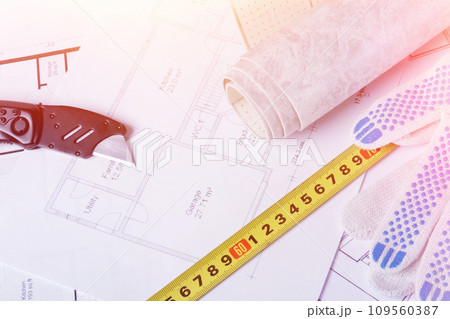 Building plan. Linoleum and flooring installation tools. Repair in the house. 109560387