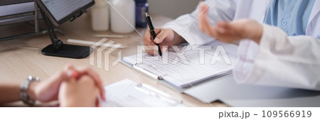 Asian psychologist women giving counseling to explaining about medicine with mental health therapy to patient in clinic while female patient stressful and anxiety with psychological health problem 109566919