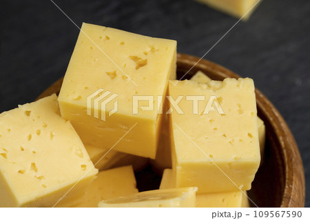 fresh orange cheese cut into cubes 109567590