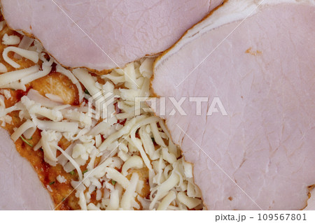 pizza dough with cheese and meat 109567801