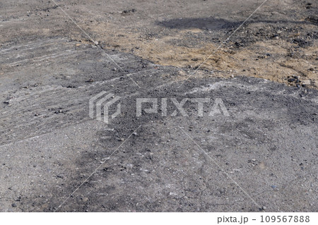 restoration of new asphalt on the highway 109567888