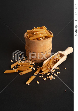 Raw Brown Pasta, Wholegrain Penne, Dry Whole Grain Noodle, Raw Spelt Macaroni, Healthy Italy Food 109568587