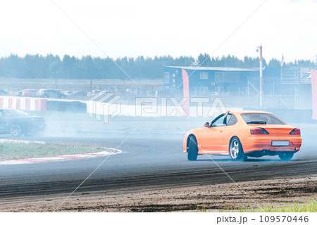 racing car in a skid. drift, tire smoke. sports car. extreme sport 109570446