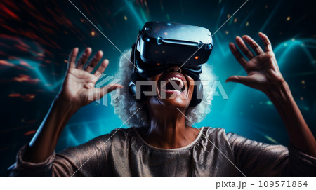 Happy smiling passionate African American dark-skinned elderly old, senior woman in virtual reality headset in futuristic style. 109571864
