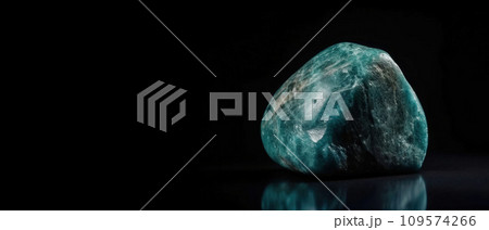 Grandidierite is a rare precious natural stone on a black background. AI generated. Header banner mockup with space. 109574266