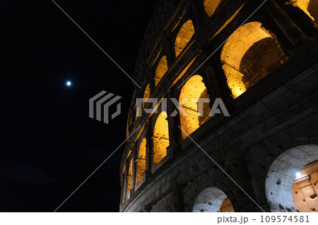 Amazing colosseum stadium exterior illuminated at night 109574581