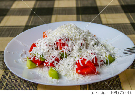 Traditional Bulgarian Shopska salad on a table 109575543