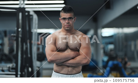Muscular Arab in the gym after a workout. 109575756