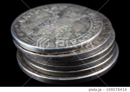 Stack of old vintage silver medieval taller coins 109578418