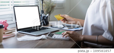 Credit card and laptop mockup for online payment, investment or savings insurance mock up. finance or woman on laptop blank screen 109581857