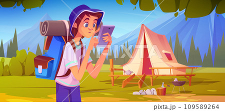 Teen boy with hiking backpack in forest near tent 109589264