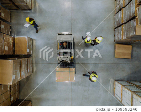 Top view of forklift in a modern warehouse storage of retail shop, large factory workshop space. Modern industrial factory with warehouse. 109593240