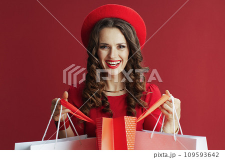 happy female on background with shopping bags happy female on background with shopping bags 109593642
