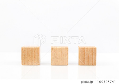Wooden cubes on a white background Wooden cubes on a white background 109595741