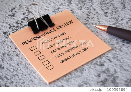 Performance Review checklist on sticky notes. Performance review concept. 109595894