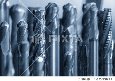Close-up scene group of the used flat or square solid end mill tools. 109599644