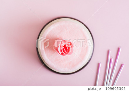 Close up of cotton candy cake and party decorations on the table top view 109605393