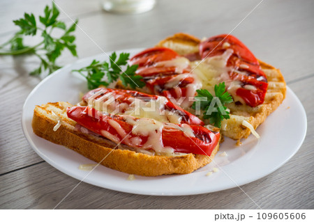 hot sandwich of fried toast bread with baked peppers and cheese hot sandwich of fried toast bread with baked peppers and cheese 109605606
