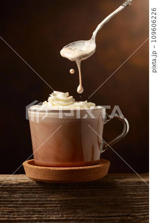 Hot chocolate with whipped cream. Hot chocolate with whipped cream. 109606226