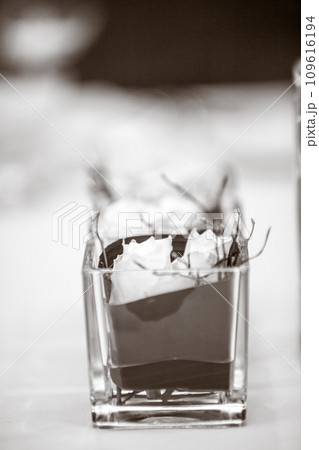 Monochrome Elegance: Floral Arrangement in a Glass Monochrome Elegance: Floral Arrangement in a Glass 109616194