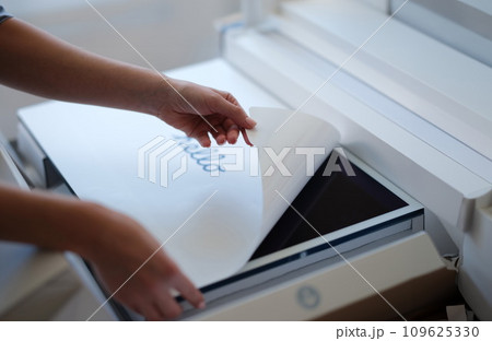 Tbilisi, Georgia - April 11, 2022: Woman removing protective film from New iMac monitor Tbilisi, Georgia - April 11, 2022: Woman removing protective film from New iMac monitor 109625330