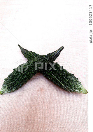 Cross of Twin Bittergourds 109625417