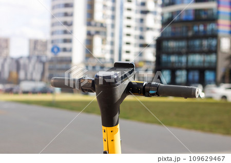Steering wheel of electric scooter background of city 109629467