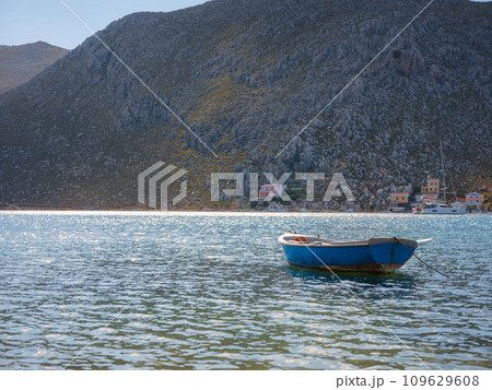 View on Symi or Simi island harbor port, classical ship yachts, houses on island hills, Aegean Sea bay. Greece islands holidays vacation travel tours from Rhodos island. Symi, Greece, Dodecanese. View on Symi or Simi island harbor port, classical ship yachts, houses on island hills, Aegean Sea bay. Greece islands holidays vacation travel tours from Rhodos island. Symi, Greece, Dodecanese. 109629608