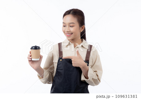 Portrait young asian barista woman wearing apron holding coffee cup and presenting isolated. Portrait young asian barista woman wearing apron holding coffee cup and presenting isolated. 109631381