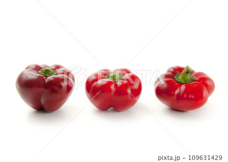 Three red bell pepper isolated on white background with clipping path. . 109631429