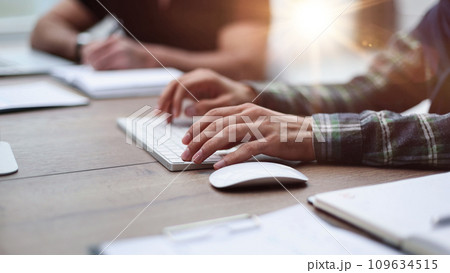 Close-up of male hands typing on laptop keyboard Close-up of male hands typing on laptop keyboard 109634515