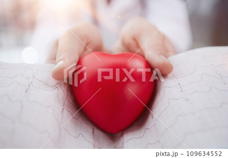 Doctor holding red heart in hands. Healthcare and medical concept. Generative AI 109634552
