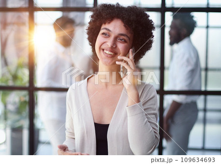 Businesswoman with phone in modern office Businesswoman with phone in modern office 109634693
