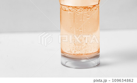 Hyaluronic acid in glass bottle on white background with clipping path close-up, Liquid gel or serum bubbles, Medicine and Pharmacology. Beauty skin care concept Beauty and spa. Hyaluronic acid in glass bottle on white background with clipping path close-up, Liquid gel or serum bubbles, Medicine and Pharmacology. Beauty skin care concept Beauty and spa. 109634862