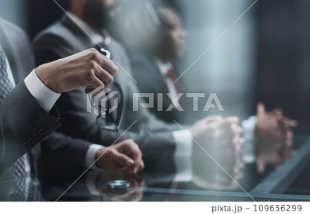 Close up of male hands holding a pair of glasses Close up of male hands holding a pair of glasses 109636299