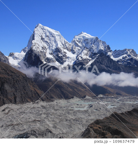 Mountains Cholatse and Taboche. Ngozumpa Glacier, Nepal. 109637479
