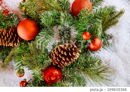 Happy New Year Christmas fir tree branches with of balls with festive decoration holiday background 109638366