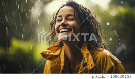 smiling lady in rain laughing in the background smiling lady in rain laughing in the background 109639155