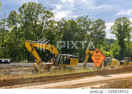 Work on construction site using excavators, tractor equipment Work on construction site using excavators, tractor equipment 109639452
