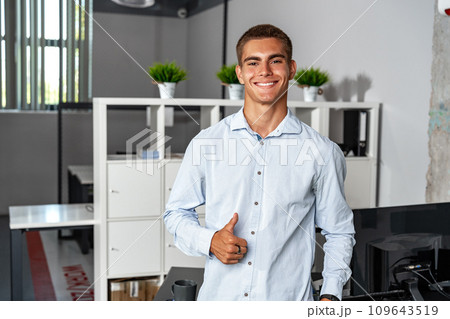 Portrait of handsome young male entrepreneur in the office 109643519