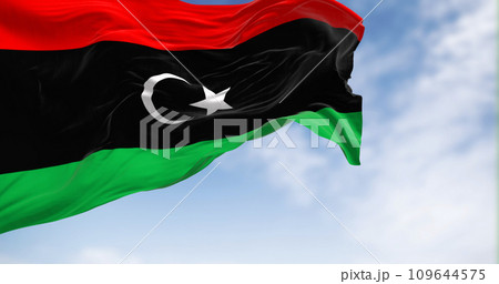 National flag of Libya waving on a clear day National flag of Libya waving on a clear day 109644575