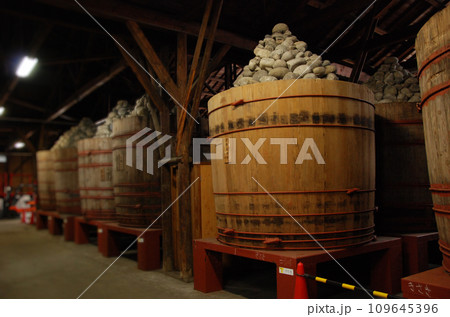 MISO barrels in MISO(soybeans) warehouse / 味噌蔵の味噌樽 MISO barrels in MISO(soybeans) warehouse / 味噌蔵の味噌樽 109645396