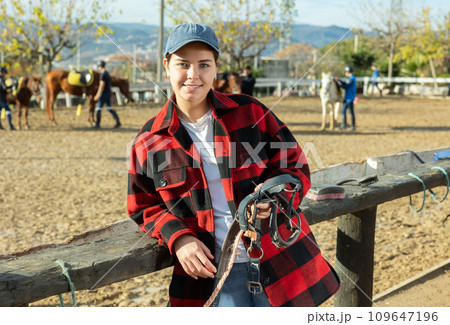Owner of horse farm shows her farm and corral for walking horses 109647196