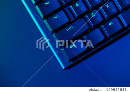 Close up of computer keyboard on black background Close up of computer keyboard on black background 109655631