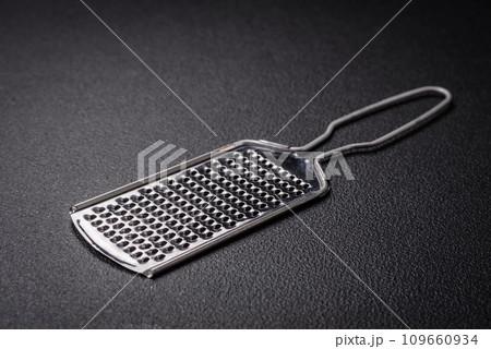 Beautiful small metal kitchen grater with handle Beautiful small metal kitchen grater with handle 109660934