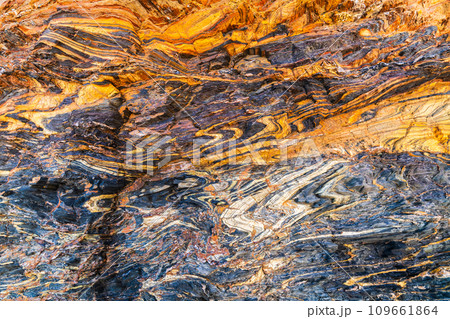 Natural marble stone background with cracks and colourful layer Natural marble stone background with cracks and colourful layer 109661864