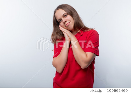 Cute teen girl smiling sweetly 109662460