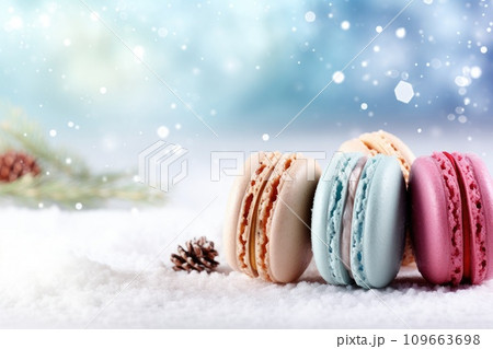 Colorful French macaroons on a winter Christmas background 109663698