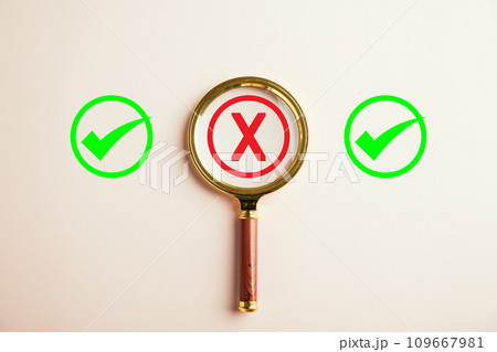 Magnifying concept for business decisions, man examines yes or no choices mark emphasizes difficulty. Hand selection signifies success. Check mark confirms decision made. Think With Yes Or No Choice. 109667981